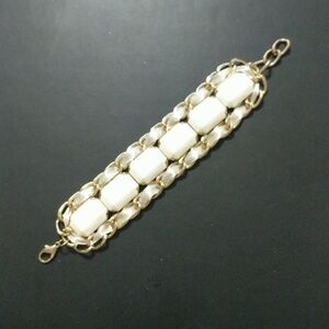 Gold Tone Chunky White Ribbon Rhinestone Statement Bracelet